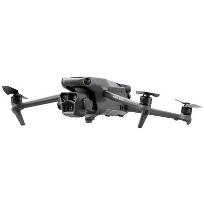 Sivý dron so štyrmi rotormi, vybavený viacerými kamerami na prednej strane, vznáša sa vo vzduchu.
