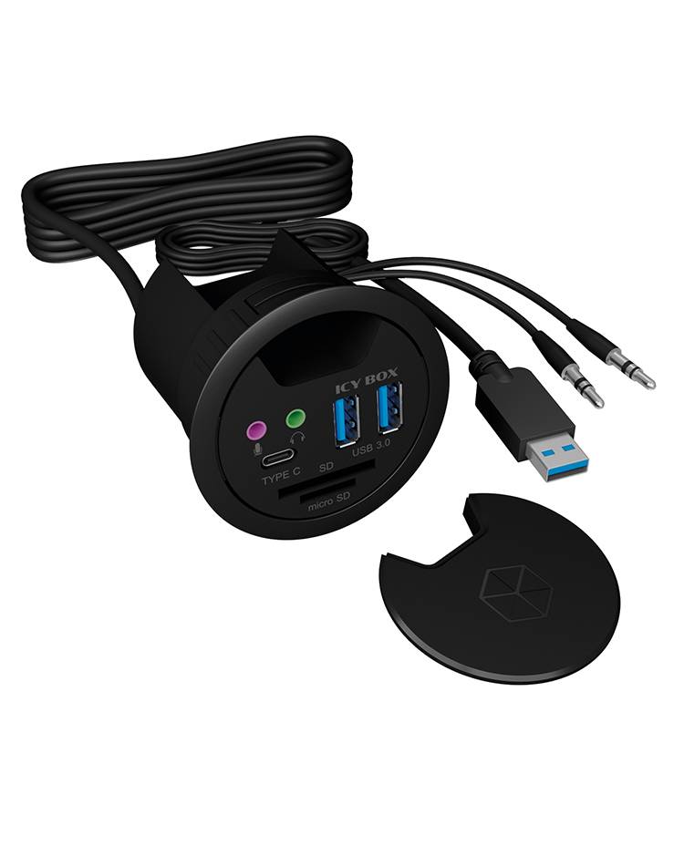 Čierny modul pre pripojenie k stolu s USB-C, dvoma USB 3.0 portami, audio konektormi a odnímateľným krytom. Ideálny pre správu káblov.