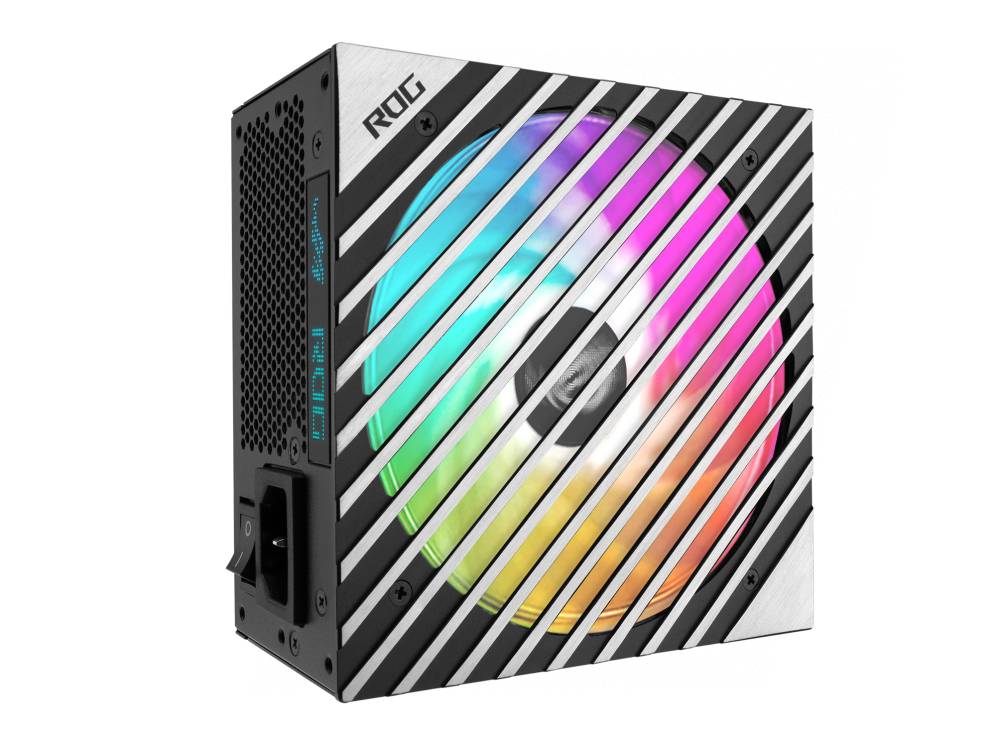 Počítačový zdroj s farebným LED ventilátorom a kovovým krytom. Viditeľné firemné logo 'ROG'.