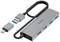 USB hub so štyrmi USB portami, jedným USB-C portom a USB-C adaptérom. Logo Hama na hornej strane.