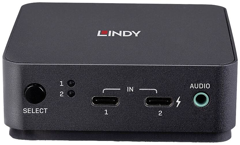 Čierny počítačový adaptér s dvoma USB-C portami, audio vstupom a prepínačom, označený logom 'Lindy'.
