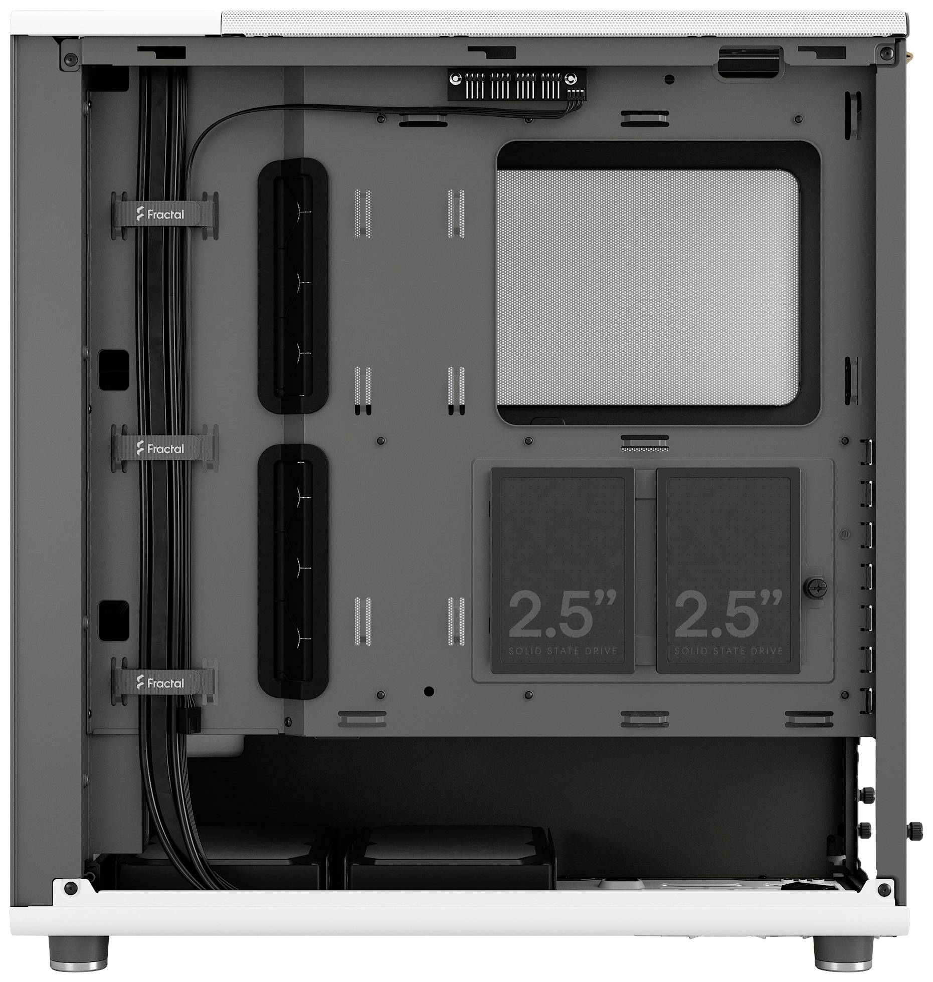 Vnútorný pohľad na počítačovú skrinku s vedením káblov a priestormi na úložné zariadenia. Viditeľné sú dva držiaky pre 2,5-palcové disky.