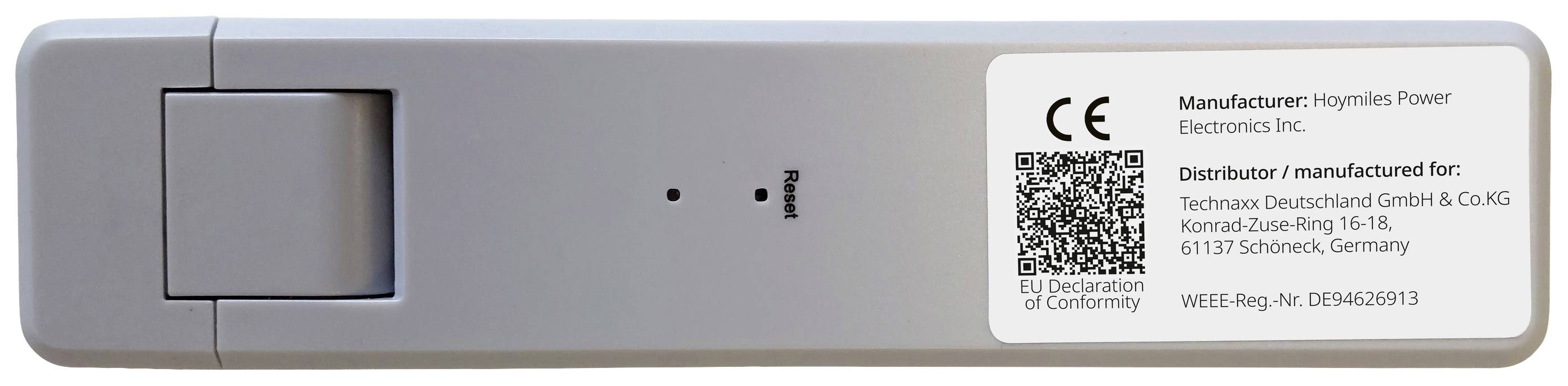 Biele zariadenie s etiketou ukazuje, že bolo vyrobené spoločnosťou 'Hoymiles Power Electronics Inc.' a distribuované spoločnosťou 'Technaxx Deutschland GmbH & Co.KG'.