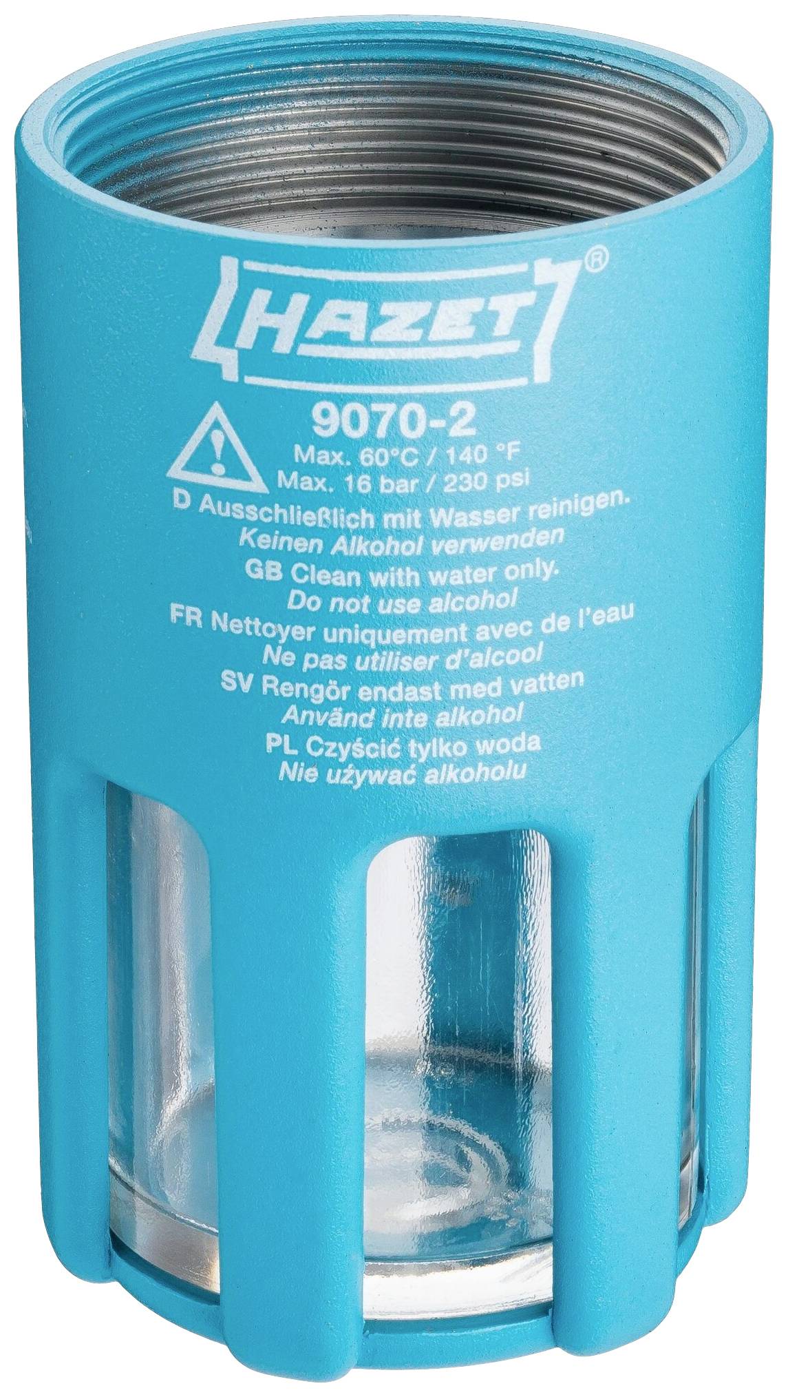 Tyrkysový olejový filter pre náradie Hazet so skleneným okienkom a nápisom s pokynmi pre tlak a čistenie.