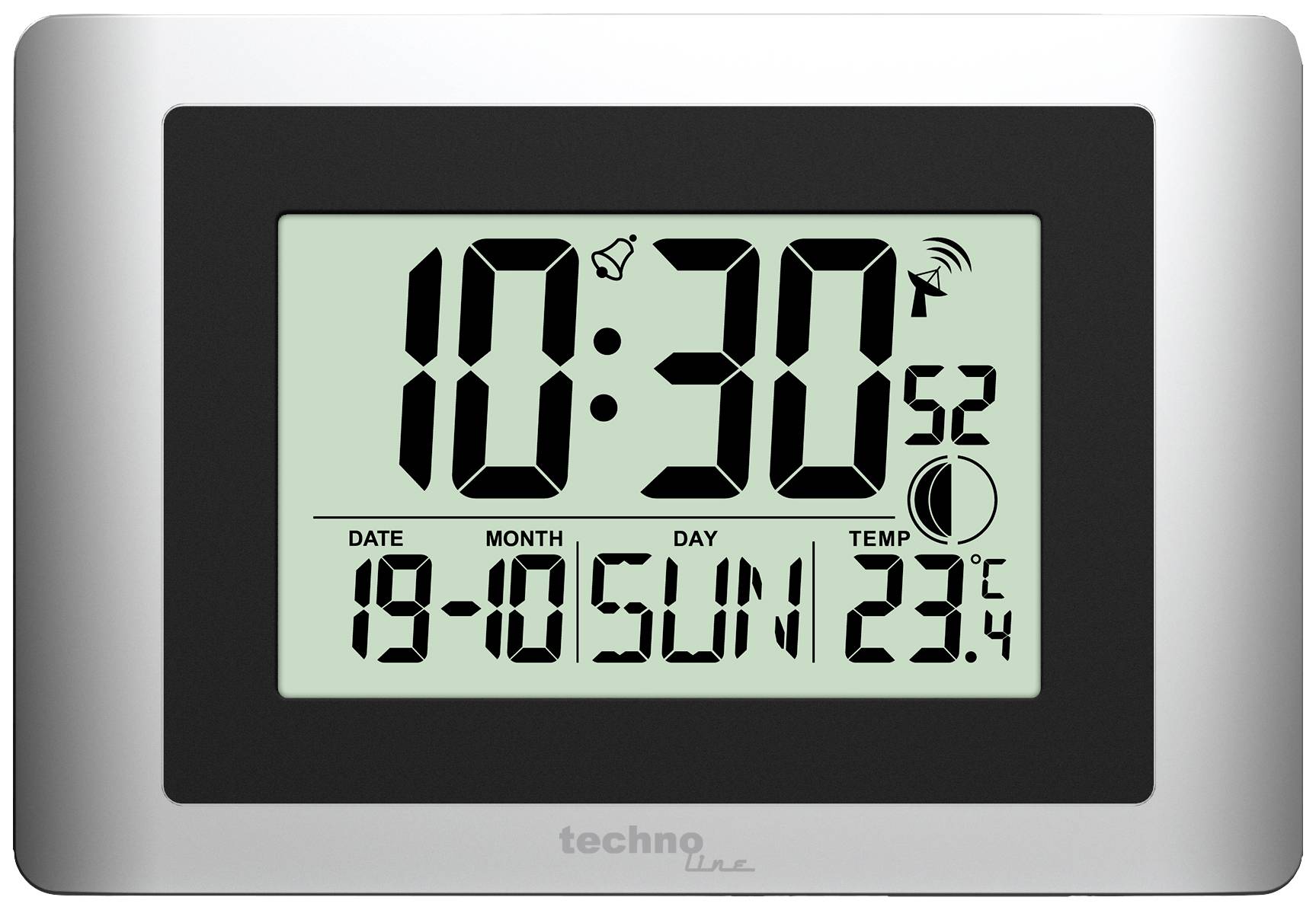 Digitálne hodiny s veľkým displejom zobrazujú čas 10:30. Nižšie sú viditeľné dátum '19-05-SON', teplota '23,4°C' a symboly.