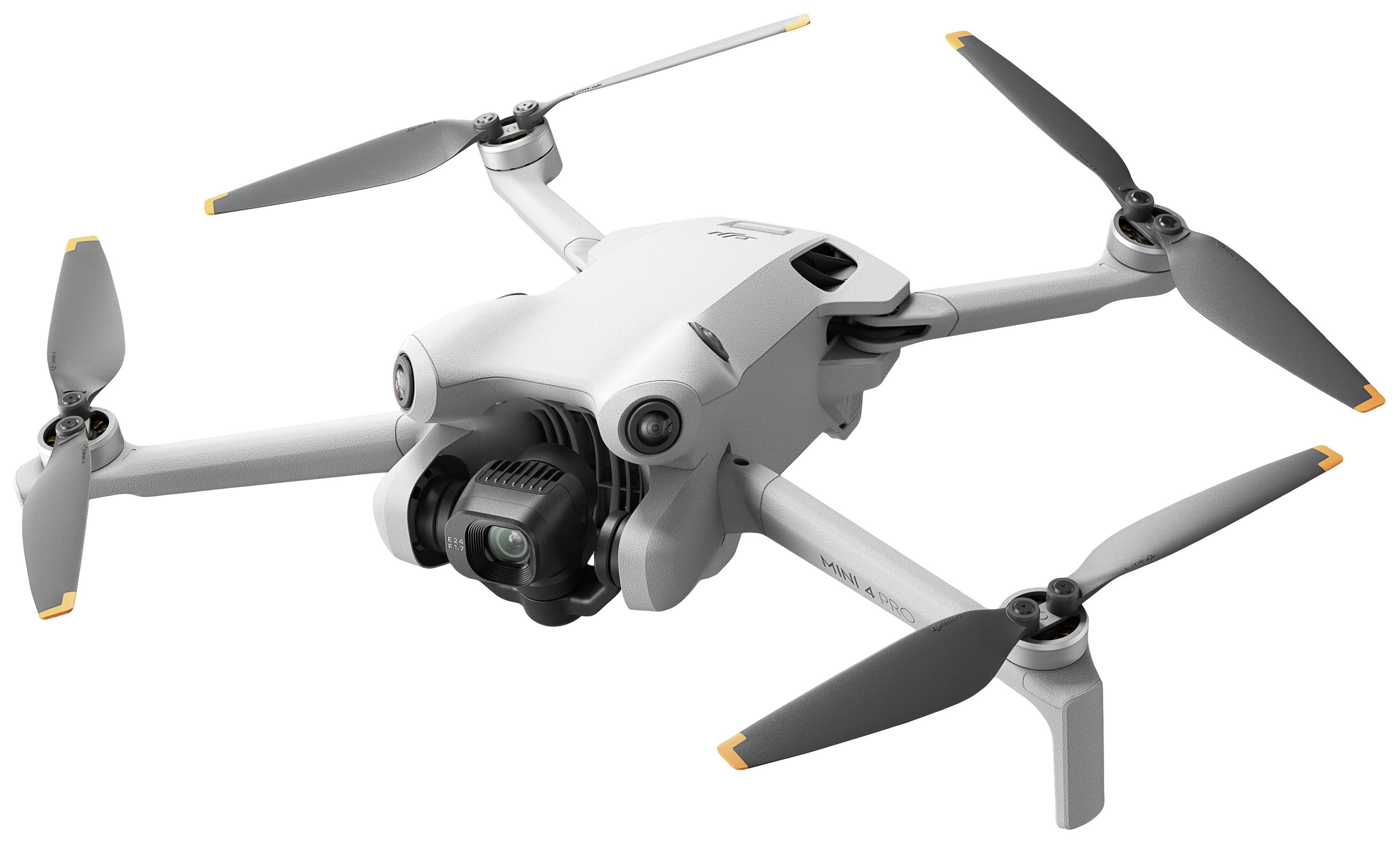 Biela štvorrotorová dron vo vzduchu, vybavená kamerou vpredu.