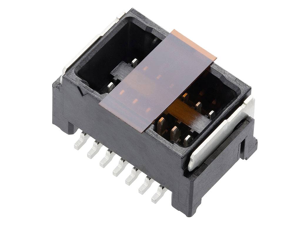 Plastový konektor s viacerými kovovými kontaktmi, vhodný pre elektronické obvody a prepojenia.