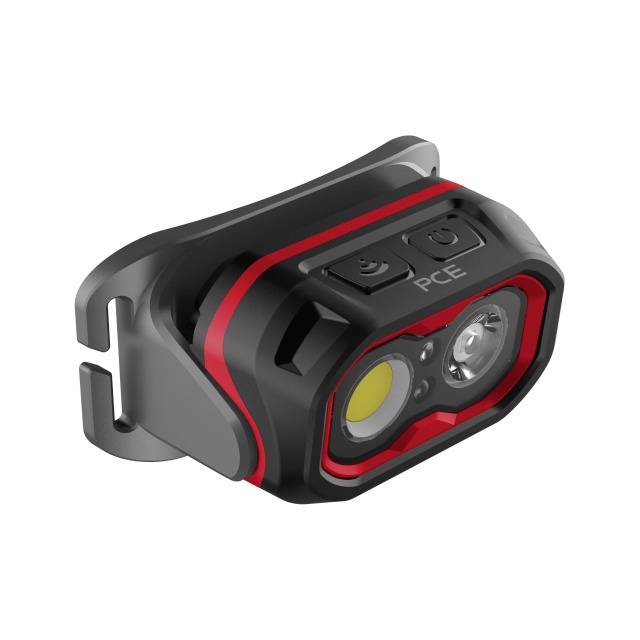 Kompaktná čelovka s LED svetlom v čiernej a červenej farbe, vybavená dvoma šošovkami a upevňovacou sponou, vhodná pre outdoorové aktivity.