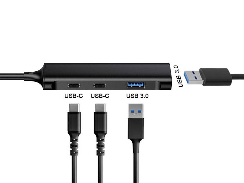 USB hub s dvoma USB-C a jedným USB 3.0 portom. Tri káble pod ním: dva USB-C a jeden USB 3.0 kábel.