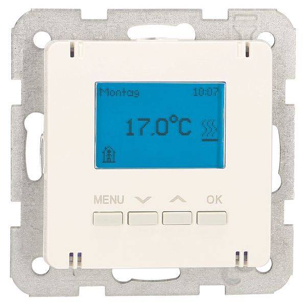 Digitálny termostat na stene, zobrazuje 'Pondelok', čas '10:07', teplota '17,0°C'. Tlačidlá dole: 'MENU', šípka hore/dole, 'OK'.