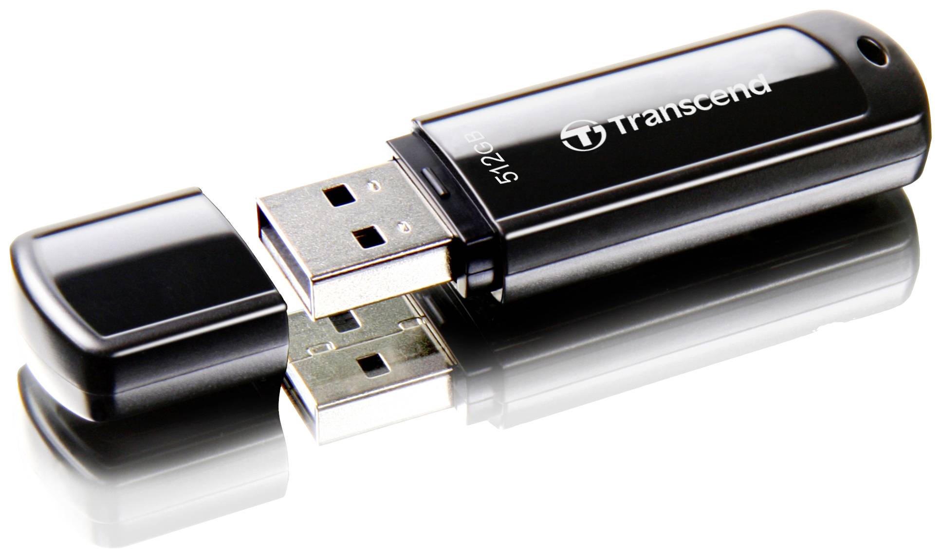 Čierny USB kľúč značky Transcend s otvoreným krytom leží na reflexnej ploche.