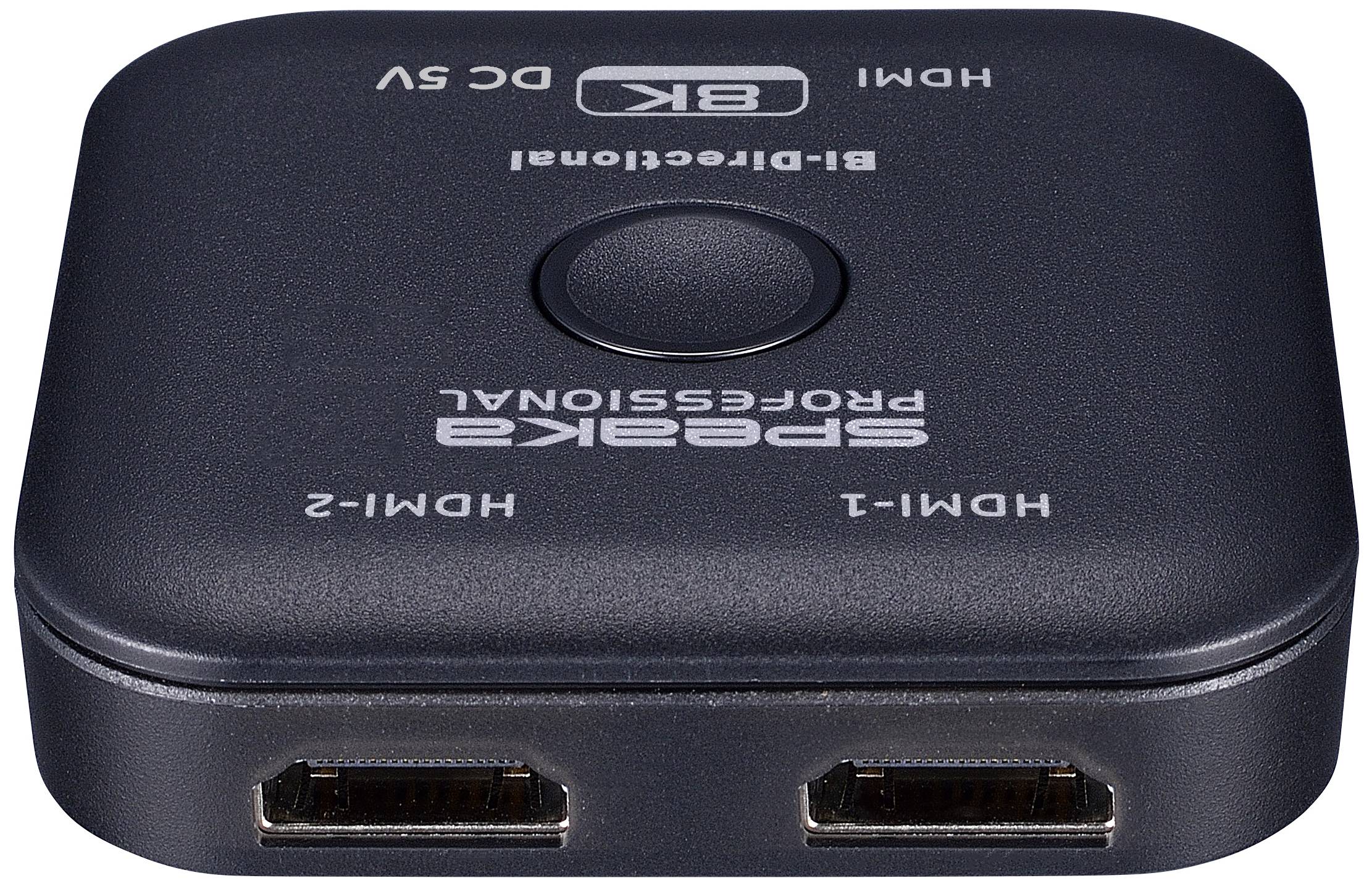 Čierny HDMI rozbočovač s dvoma HDMI výstupmi, jedným DC napájacím vstupom a centrálnym tlačidlom. Značka 'SPEAKA' je viditeľná.