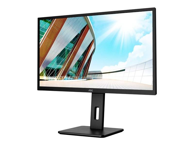 Počítačový monitor zobrazuje moderné budovu s modrým nebom v pozadí. Monitor má tenký, čierny rám.
