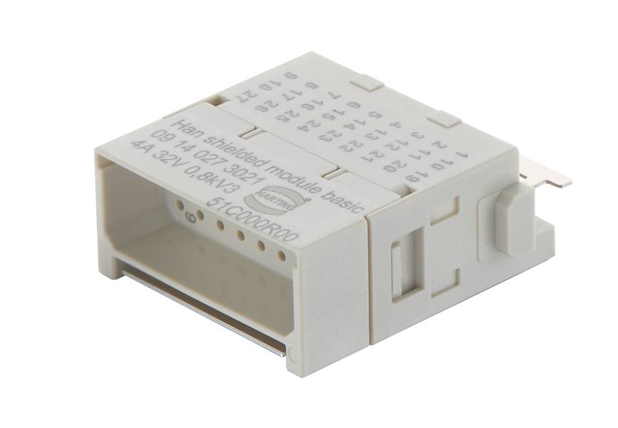 Sivý elektrický zástrčkový modul s nápisom 'Han shielded module basic' a technickými špecifikáciami.