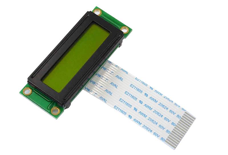Malý obdĺžnikový elektronický displej s plochým pásom káblov, pravdepodobne určený pre technické aplikácie alebo integráciu do zariadení.