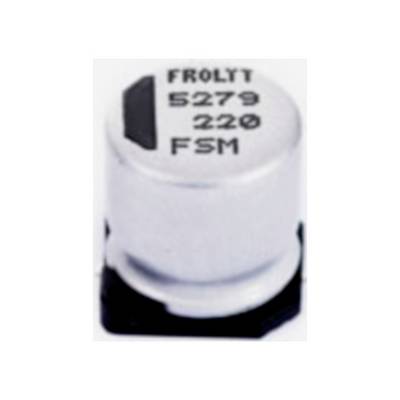 Valcový elektrolytický kondenzátor striebornej farby s čiernym označením nesie nápis 'Frolyt 5279 220 FSM'.