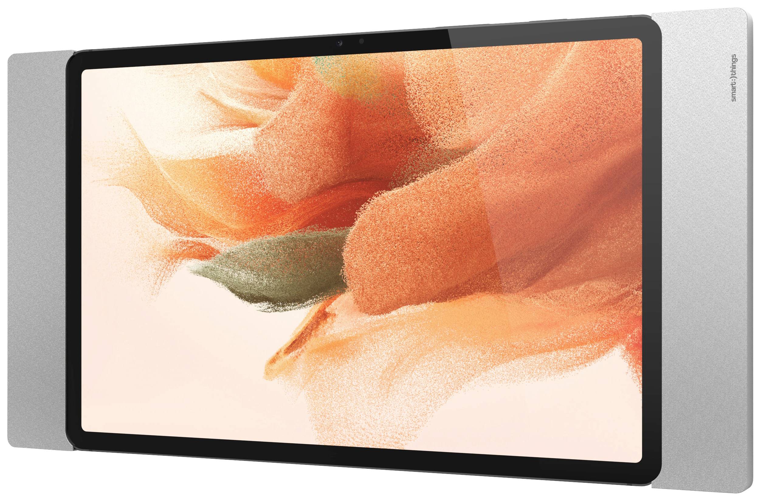 Tablet s kvetinovou, oranžovou tapetou na obrazovke, lemované úzkymi sivými reproduktormi.