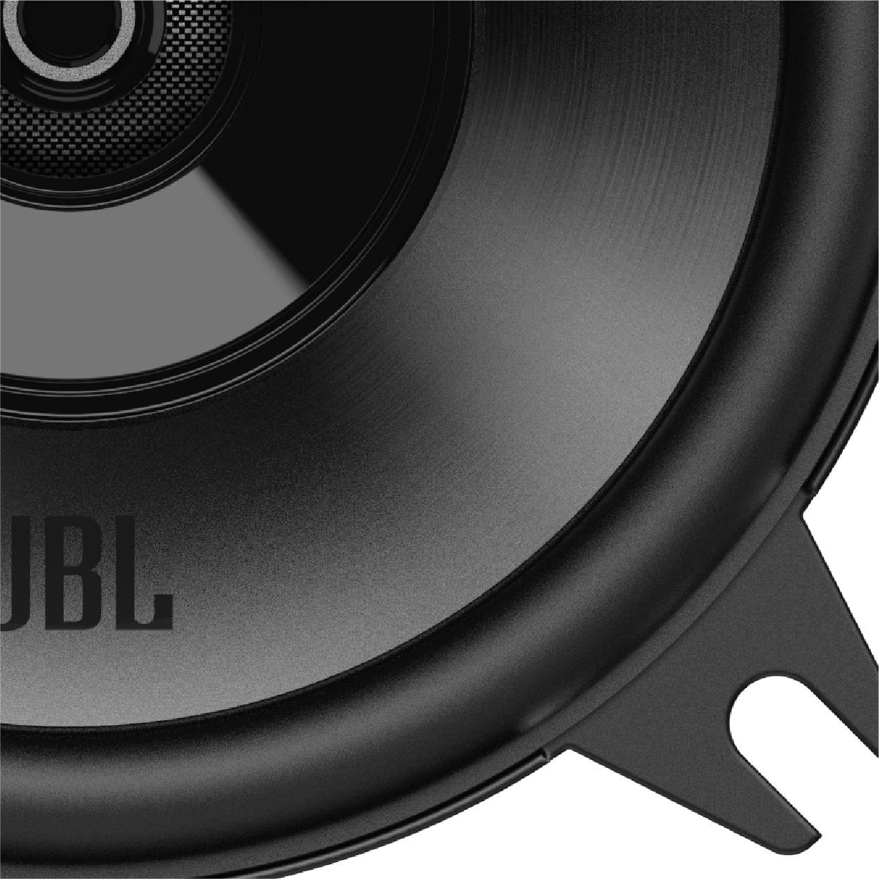 Detailný záber reproduktora so značkou 'JBL' na membráne, ktorý je súčasťou zvukového zariadenia.