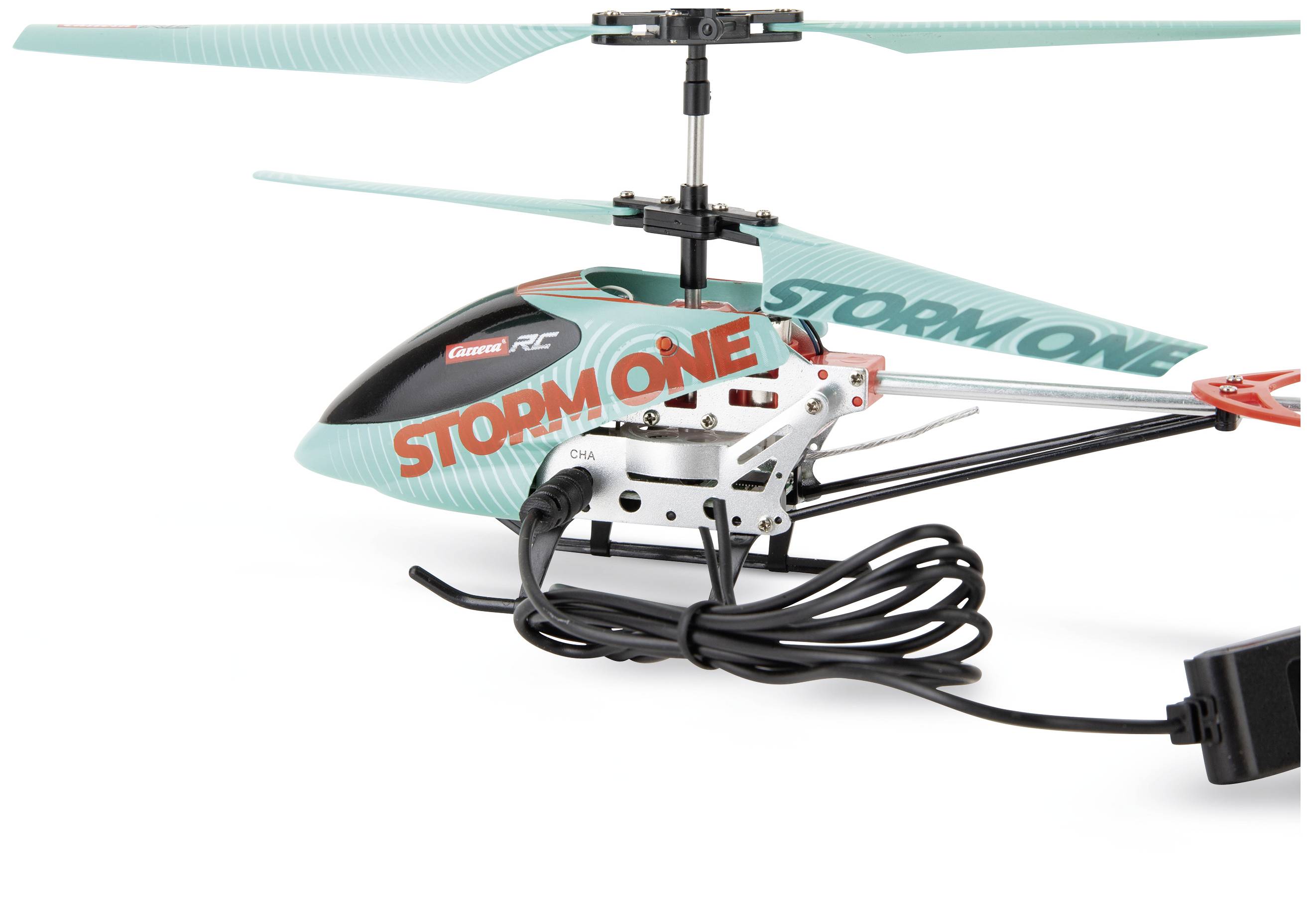 Diaľkovo ovládaný vrtuľník s modelovým názvom 'Storm One'. Zobrazuje dvojitý rotorový systém a nabíjací kábel na boku.