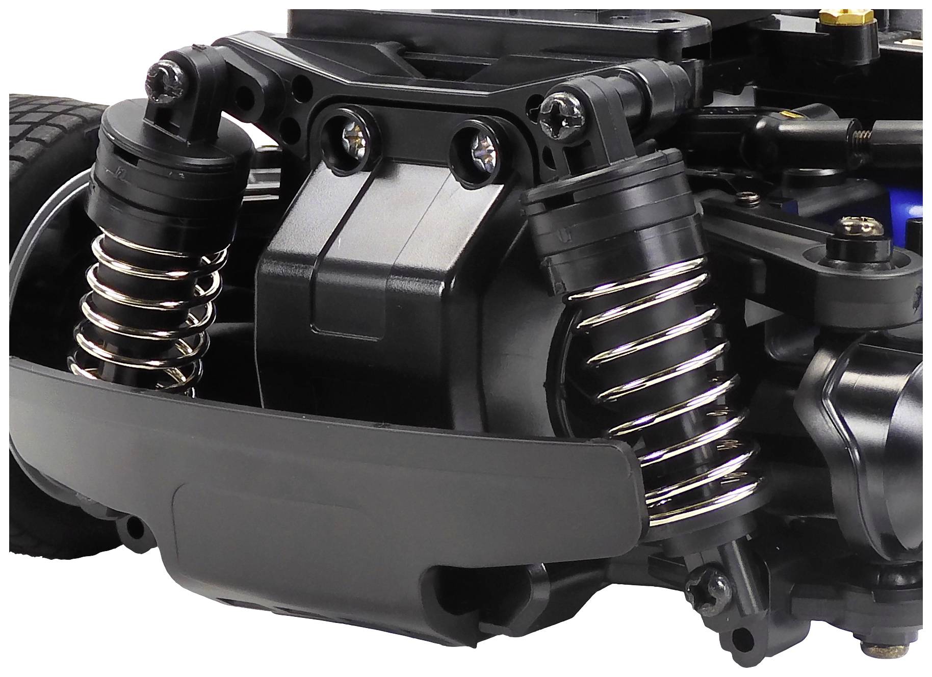 Detailný záber systému odpruženia hračkárskeho auta so tlmičmi a pružinami, ktoré zabezpečujú stabilitu a tlmenie nárazov.