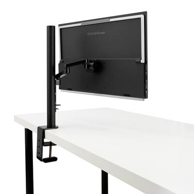 Monitor je pripevnený na stole pomocou nastaviteľného ramena, ktoré poskytuje flexibilitu a šetrí priestor.