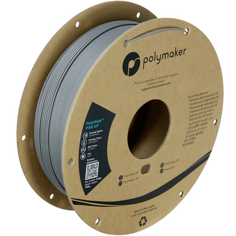 3D tlačiarenská rolka filamentu od Polymaker. Nápis zobrazuje typ materiálu 'PolyMide PA6-GF' a QR kód. Rolka vyrobená z recyklovaného kartónu.