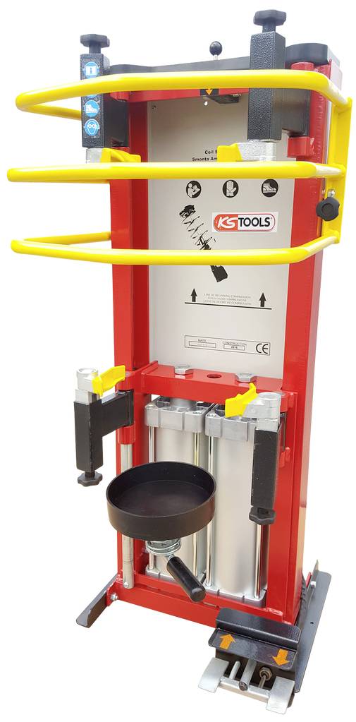 Červený hydraulickýlis s pružinovým mechanizmom od KS Tools, vybavený žltými bezpečnostnými popruhmi a ovládacou pákou, určený pre použitie v dielni.