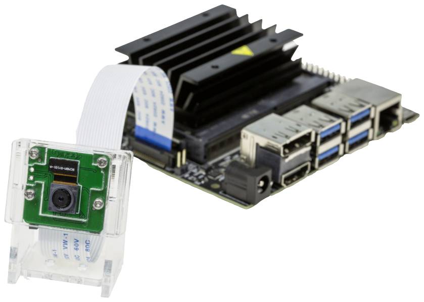 Kamera je pripojená k vývojovému kompletu. Kamera je umiestnená v priehľadnom kryte. Komplet má niekoľko USB portov.