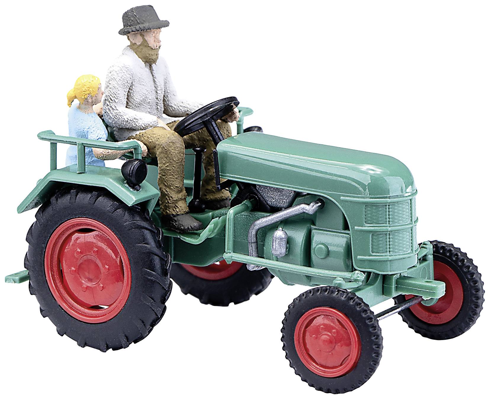 Modelový traktor s mužom za volantom a dieťaťom ako spolujazdcom. Obe figúrky sedia na zelenom traktore s červenými kolesami.