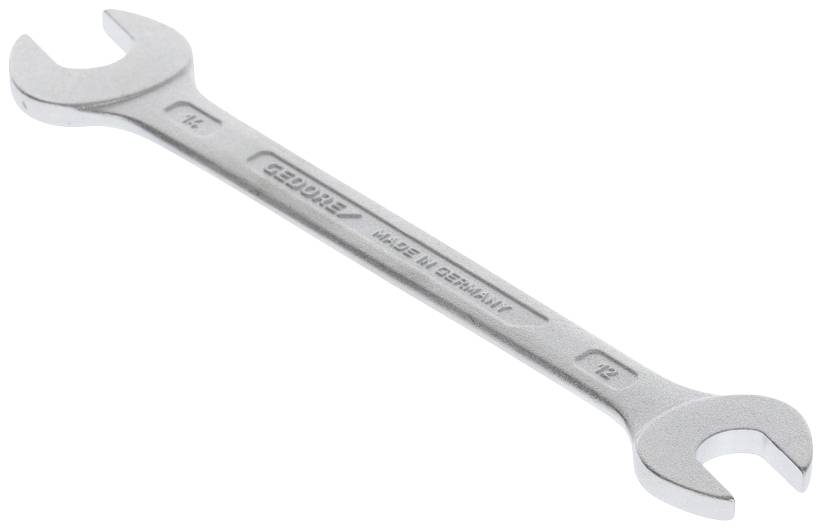 Strieborný vidlicový kľúč s rozmermi '10' a '12', vyrobený v Nemecku. Hlavný nástroj na uťahovanie skrutiek.