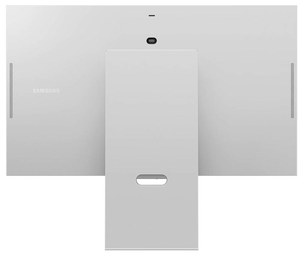 Monitor je v striebornej farbe zozadu, s centrálnou stojanom a viditeľným názvom značky, pričom ponúka minimalistickú estetiku a modernú funkcionalitu.