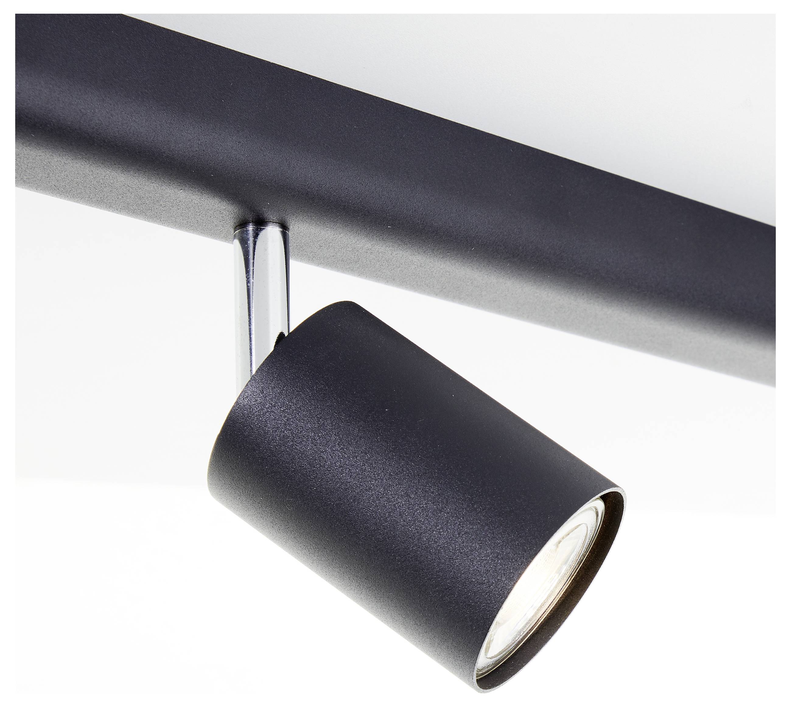 Čierny stropný reflektor s valcovitou svetelnou hlavicou smerujúcou nadol. Moderný dizajnový štýl.