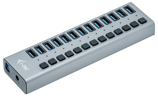 Strieborný USB hub so 16 USB portami, pričom každý port má čierny prepínač na zapnutie a vypnutie jednotlivých portov.