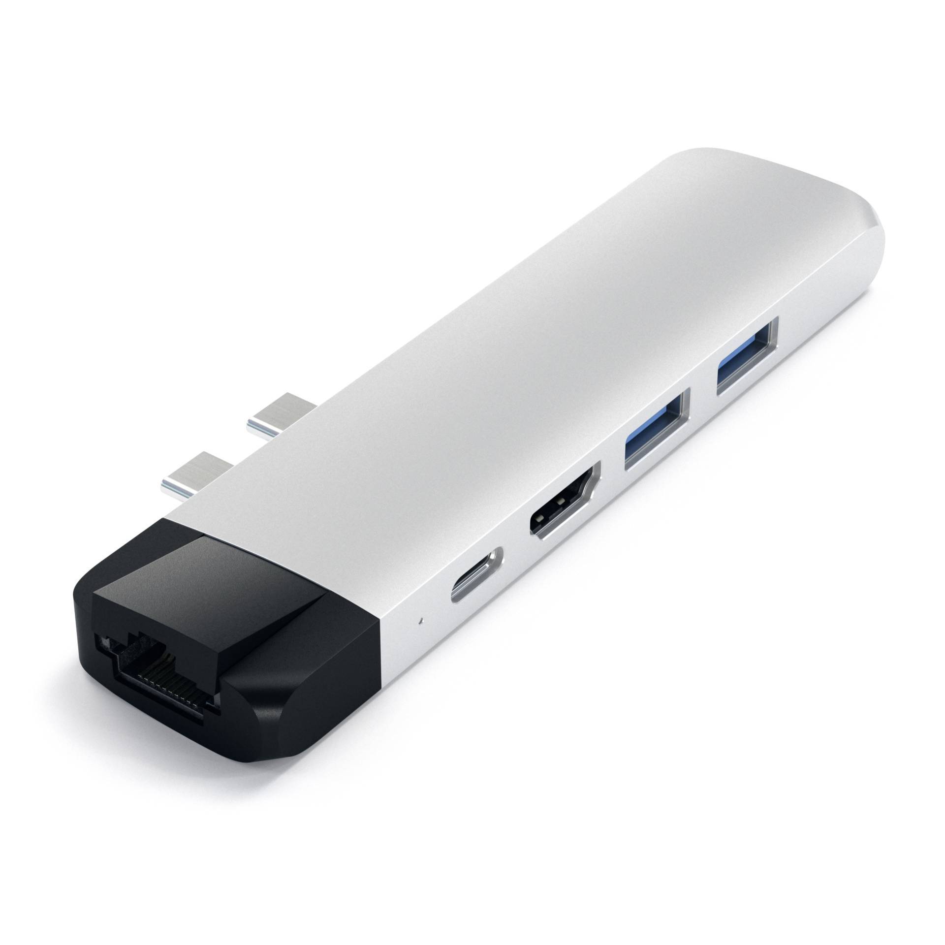 Multifunkčný adaptér v striebornej farbe s portmi pre USB, HDMI a Ethernet, ktorý zobrazuje rôznorodosť pripojení v kompaktnom dizajne.