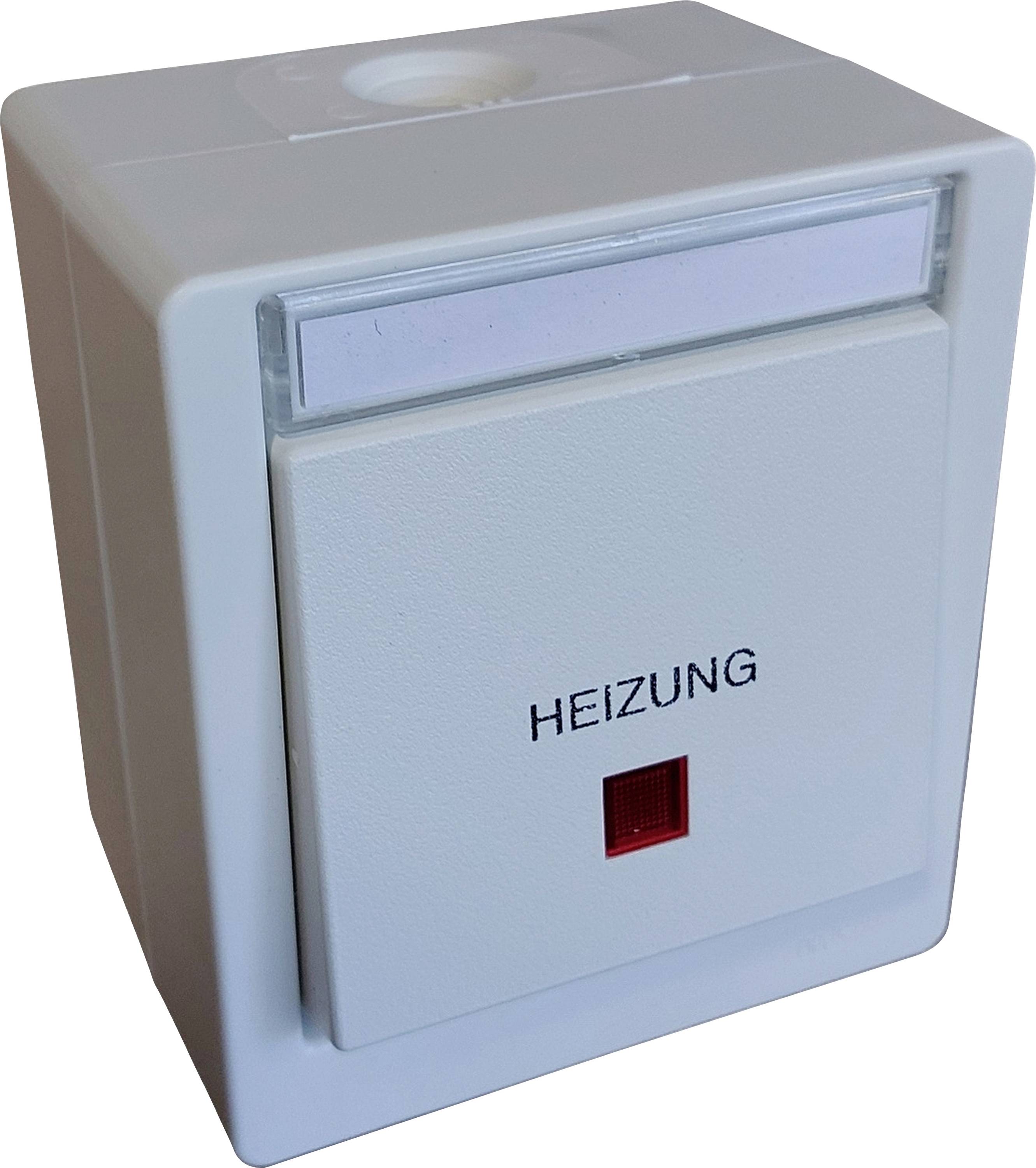 Sivé elektrické nástenné zariadenie s nápisom 'KÚRENIE' a malým červeným spínačom pod ním.