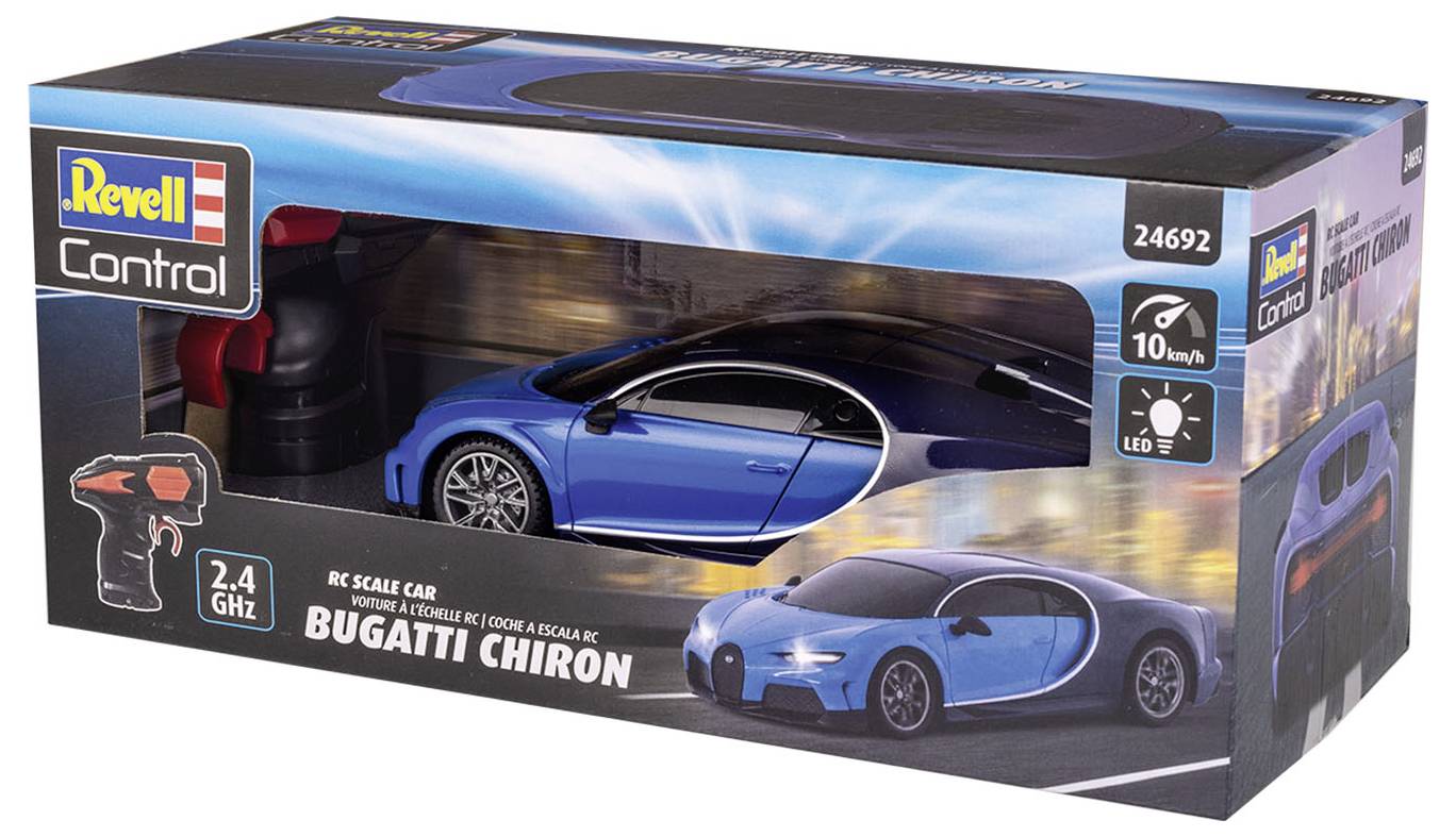 Kartónová škatuľa s modrým hračkárskym autom 'Bugatti Chiron', diaľkovým ovládačom a logom značky Revell.