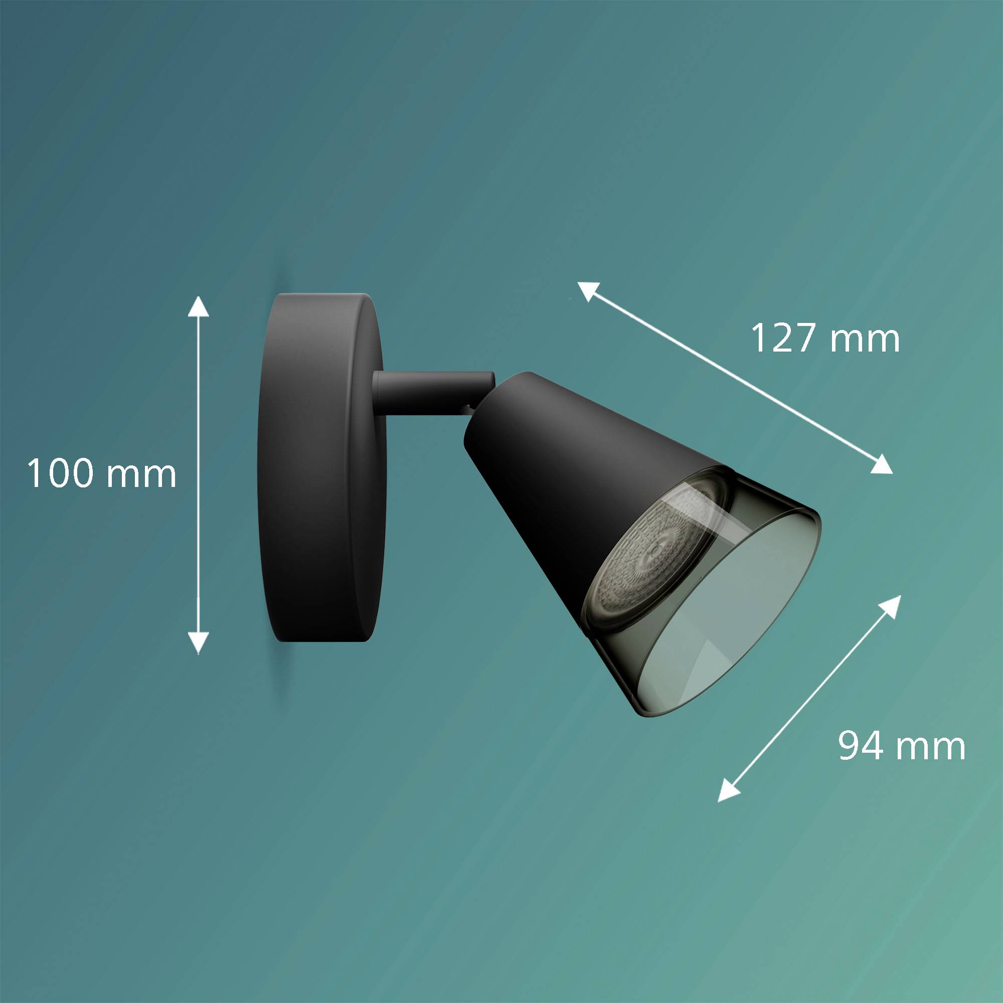 Čierna nástenná lampa s kónickým tienidlom. Rozmery sú 127 mm dĺžka, 100 mm výška, 94 mm priemer tienidla. Pozadie v zelenej farbe.