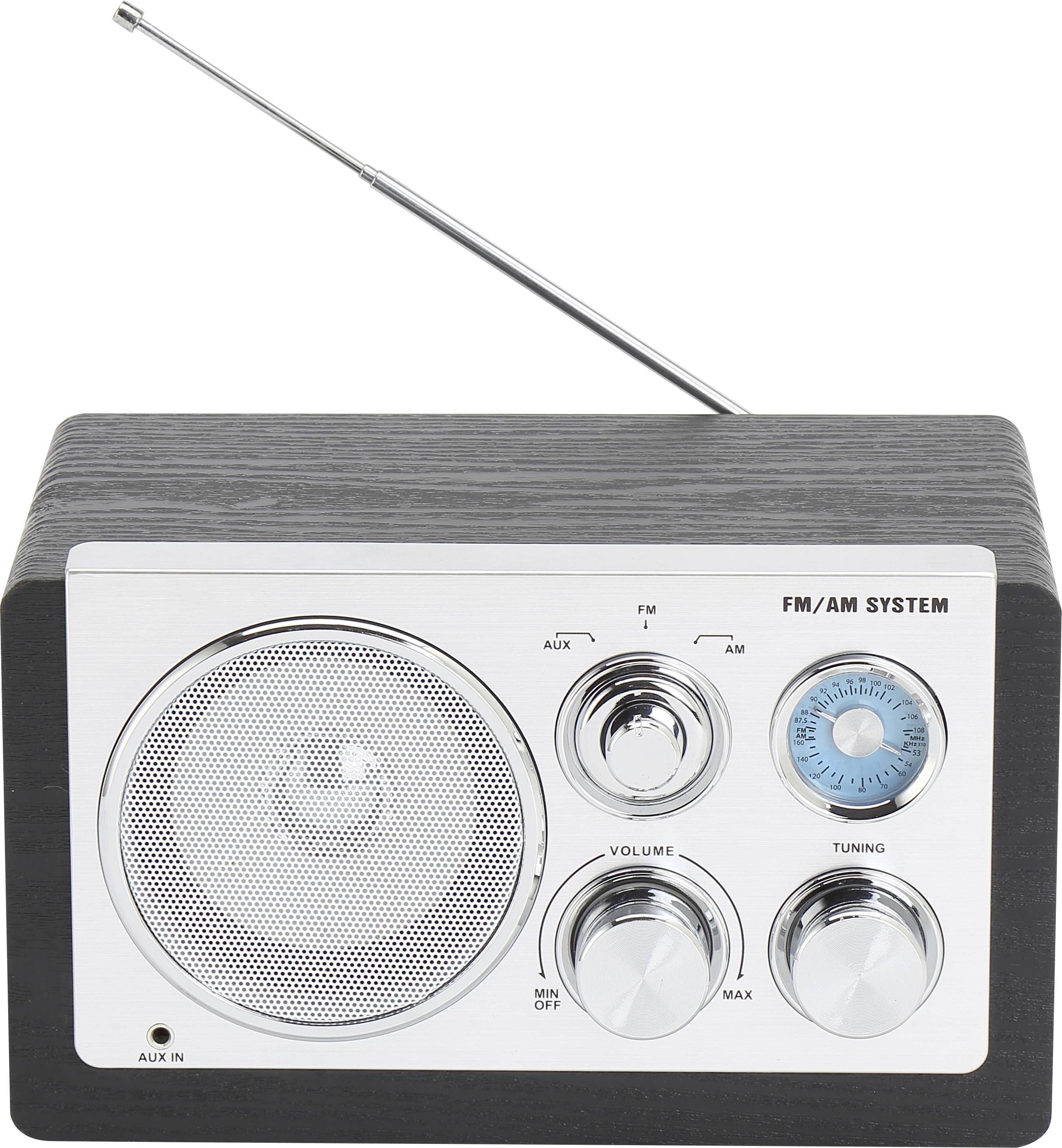 Retro rádio s FM/AM systémom, čiernym krytom a striebornými ovládacími prvkami. Viditeľné sú regulátor hlasitosti a ladiaci gombík.