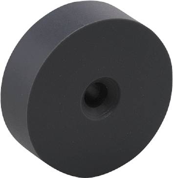 Čierne okrúhle koleso alebo disk z pevného materiálu s centrálnym otvorom, pravdepodobne súčasť mechanizmu.
