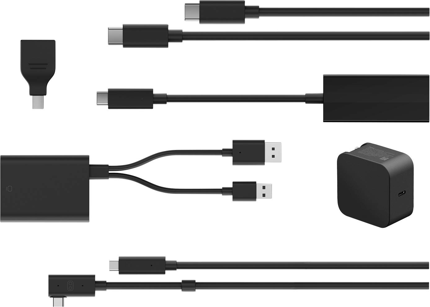 Rôzne čierne káble a adaptéry vrátane USB-C a USB-A konektorov, usporiadané na bielom pozadí.