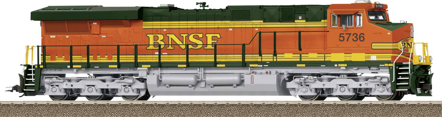 Nákladný vlak v oranžovo-zelenej farbe s nápisom 'BNSF' stojí na koľaji. Lokomotíva má číslo 5736.