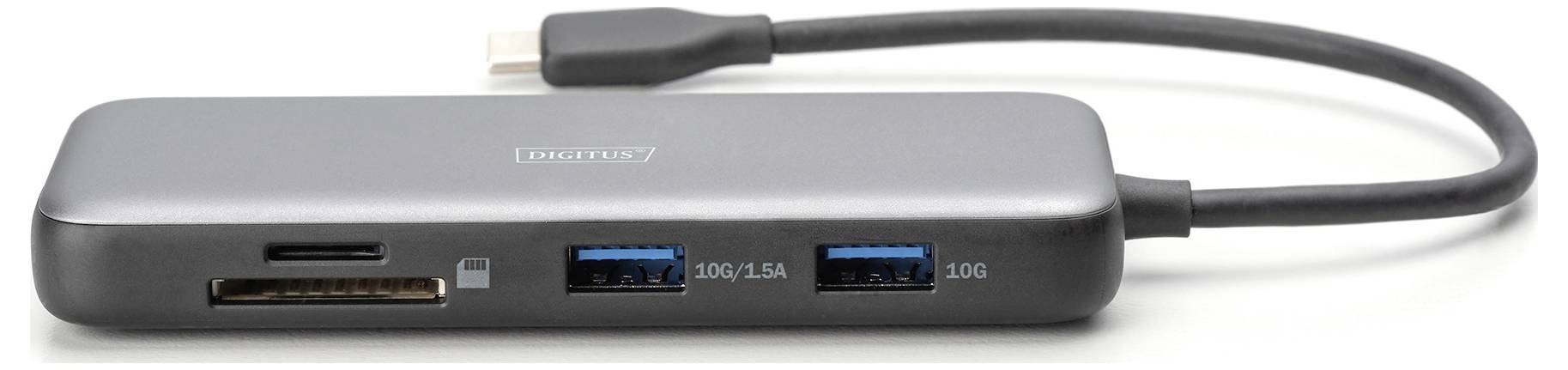 Sivý USB-C hub s portami pre HDMI, čítačku SD kariet a dva USB porty. Umožňuje pripojiť viacero zariadení k jednému počítaču.