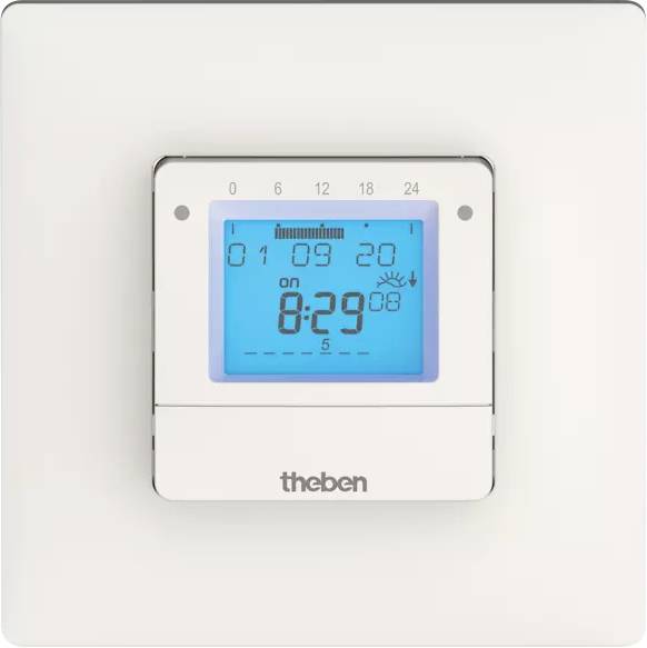 Elektronický termostat s modrým displejom zobrazuje čas 8:29 a symbol slnka. Označenie 'theben' dole.
