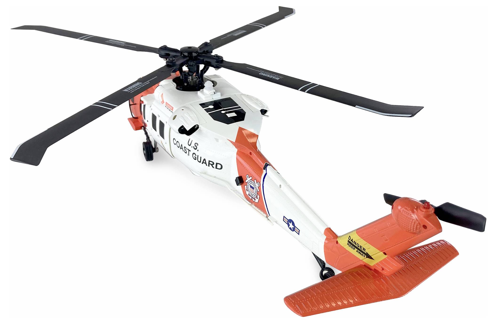 Hračkársky vrtuľník v bielej a oranžovej farbe s nápisom "U.S. Coast Guard".