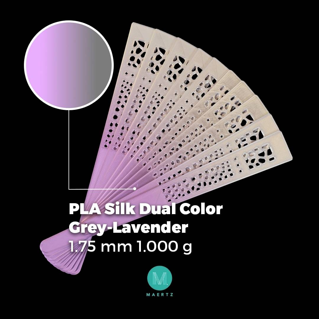 Vejár z PLA Silk Dual Color v sivej a levanduľovej farbe, 1,75 mm, 1000 g. Viditeľný farebný prechod zo sivej do levanduľovej.