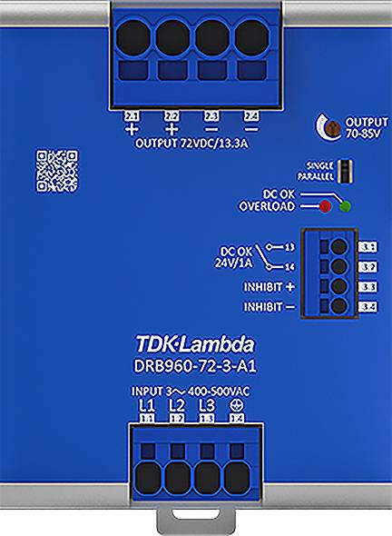 Modrý elektronický prístroj s logom TDK, s viacerými vstupmi a výstupmi a popiskami napäťového vstupu a výstupu.