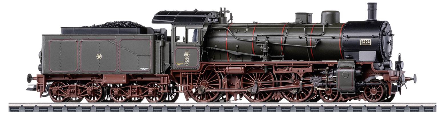 Obrázok zobrazuje model historickej parnej lokomotívy z bočného pohľadu. Je detailne nalakovaný čiernymi a červenými akcentmi.