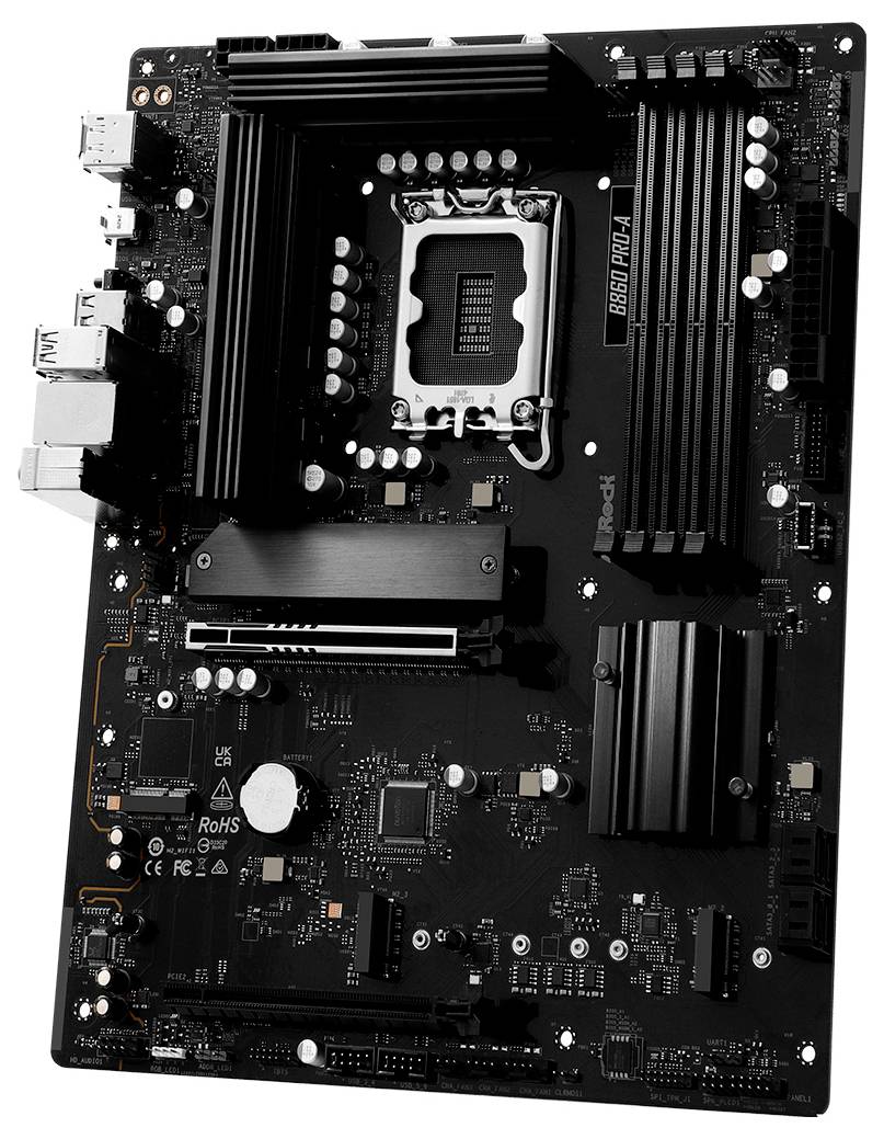 Čierná počítačová základná doska s viacerými slotmi a portami, vrátane socketu pre CPU a slotu pre RAM, ktorá je nevyhnutná pre zostavenie alebo modernizáciu počítača.