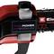 Motorová píla v detailnom zábere, sfarbená do červeno-čiernej. Nálepka zobrazuje 'PUREPOWER BRUSHLESS' pre výkonný motor.