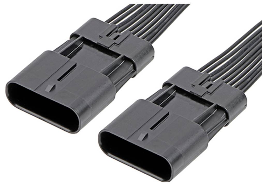 Dva čierne obdĺžnikové elektrické konektory s viacerými káblami, ležiace vedľa seba na bielom pozadí.